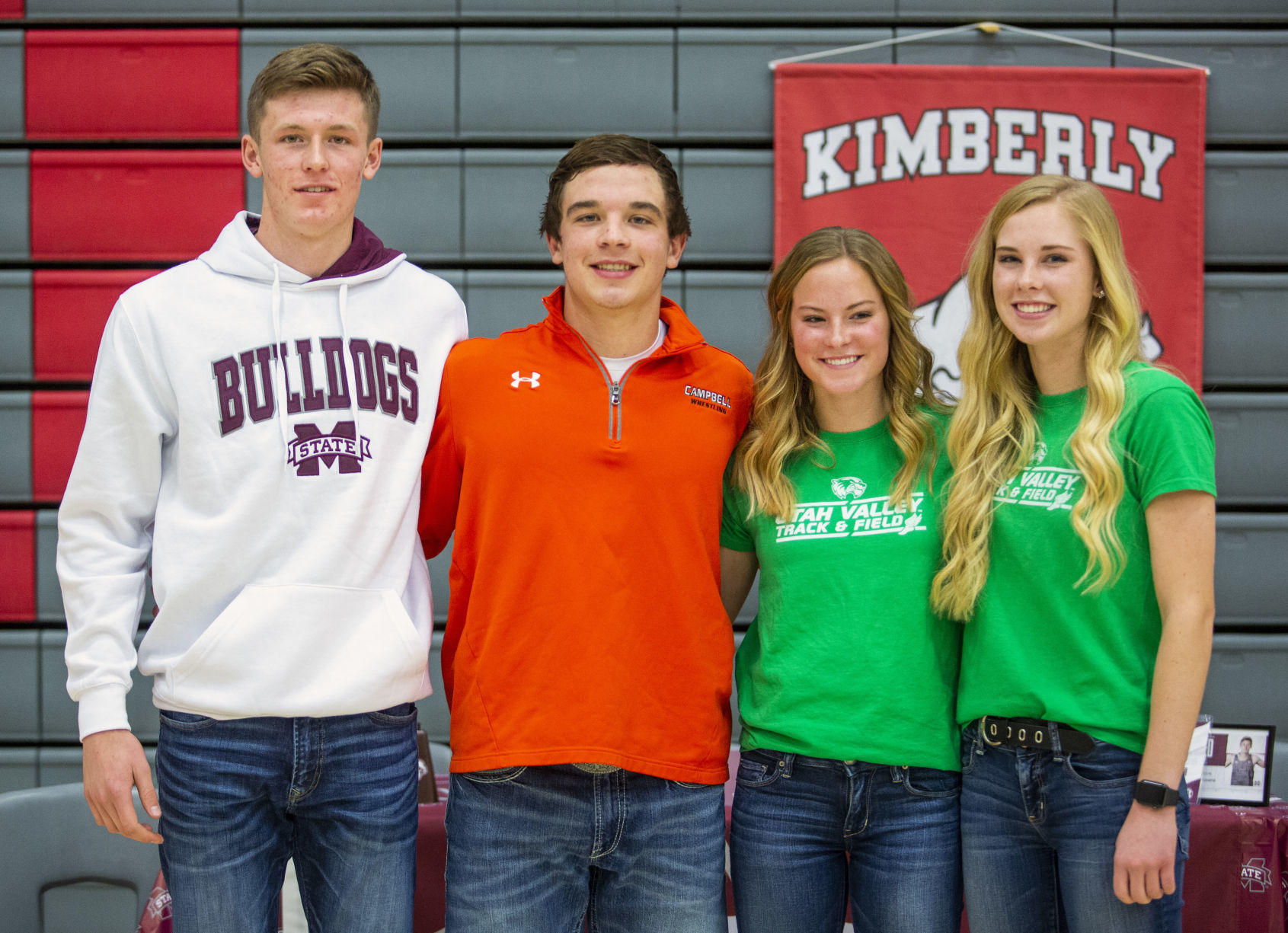 Four Kimberly students sign college letters of intent